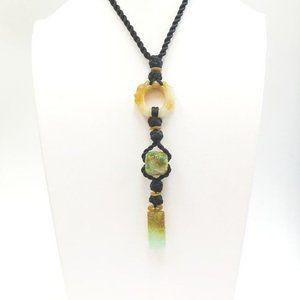 Hand Carved Jade Necklace on thick black rope